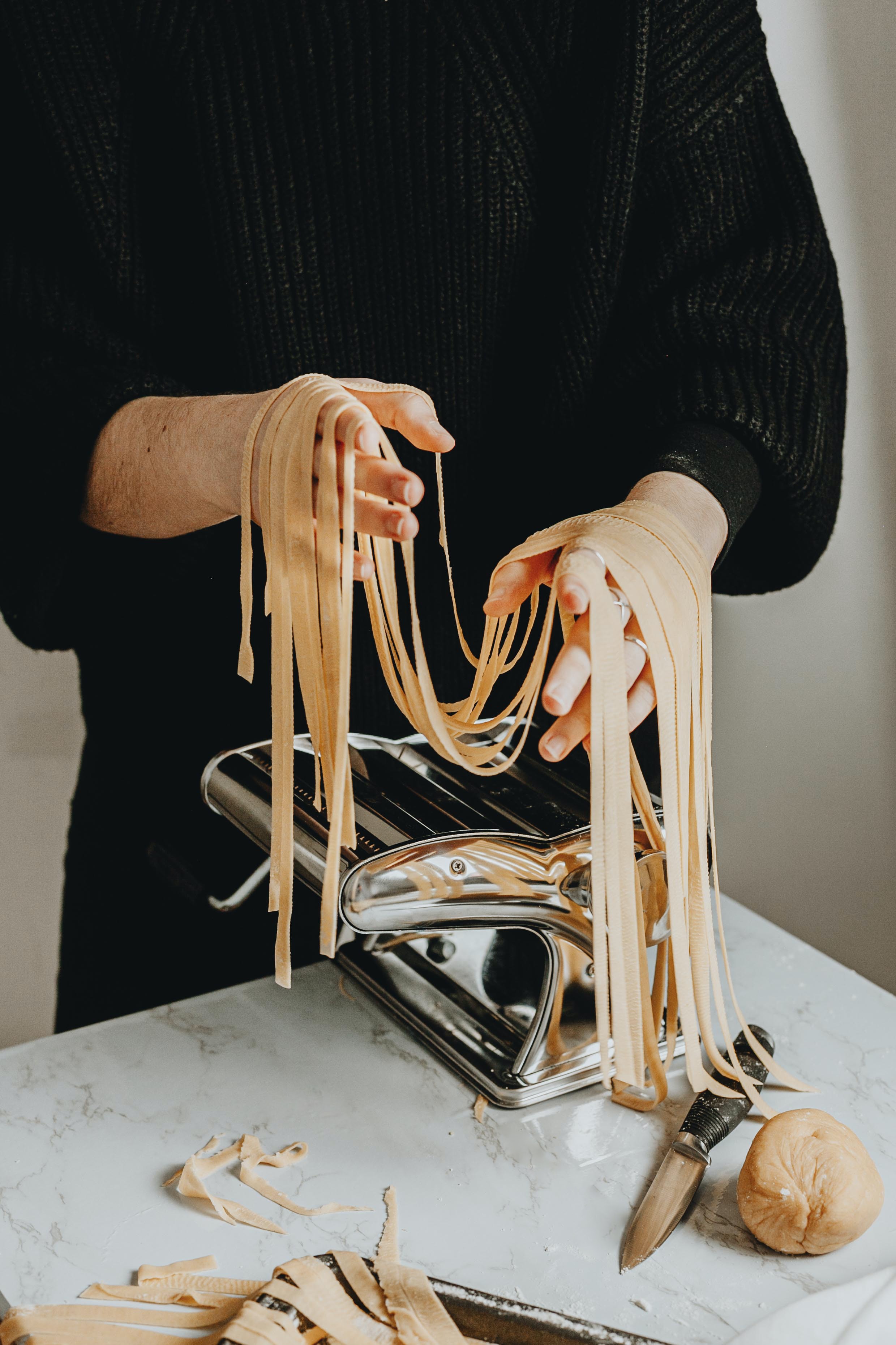 image of someone making pasta